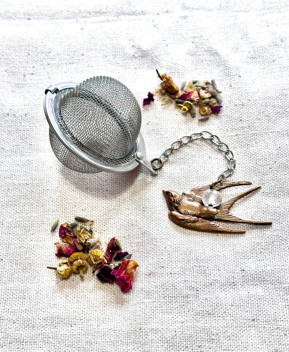 Tea Ball with Bronze Bird Charm and Rose Quartz Bead